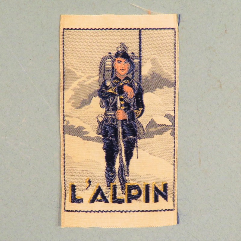 INSIGNE TISSU FANTAISIE "L'ALPIN" CHASSEUR ALPIN DES ANNEES 1930 A IDENTIFIER ??