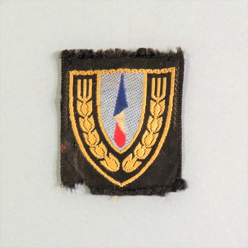 INSIGNE DE BERET EN TISSU "SECTEUR BLEU" CHANTIERS DE JEUNESSE CJF PRODUCTION INDUSTRIEL