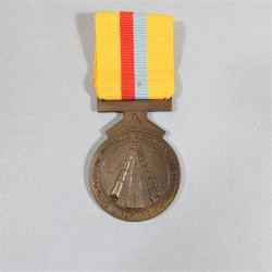 ZIMBABWE MEDAILLE POUR LA CAMPAGNE AU MOZAMBIQUE OU DEFENSE DES PIPELINE1984-1985 CAMPAGN RENAMO ATTRIBUEE NAMED °