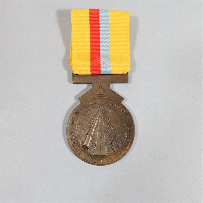 ZIMBABWE MEDAILLE POUR LA CAMPAGNE AU MOZAMBIQUE OU DEFENSE DES PIPELINE1984-1985 CAMPAGN RENAMO ATTRIBUEE NAMED °