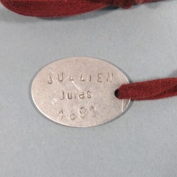 PLAQUE D'IDENTITE MILITAIRE TROUPE JULIEN JULES CLASSE 1892 MONTELIMAR MATRICULE 231 GUERRE 1914-1918