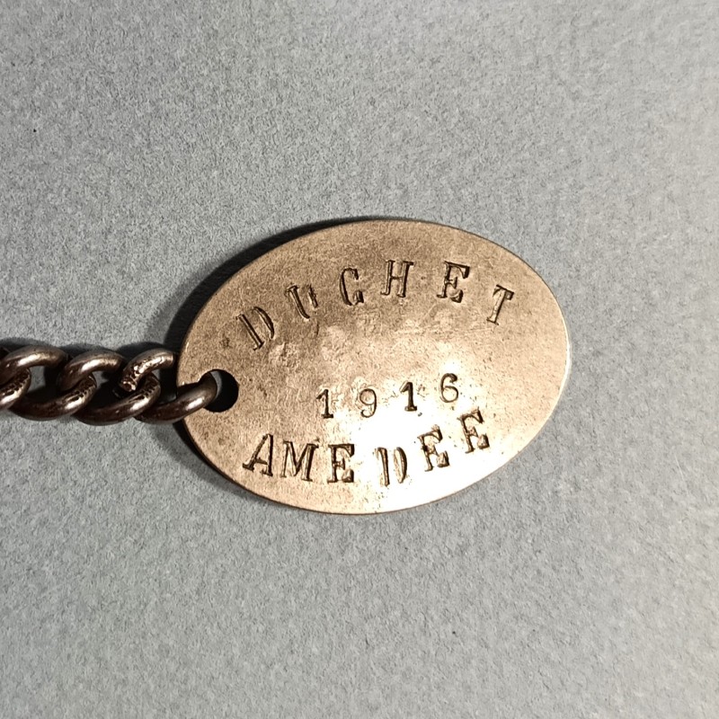 PLAQUE D'IDENTITE MILITAIRE TROUPE DUCHET AMEDEE JEAN SOLDAT AU 6 ème REGIMENT D'INFANTERIE COLONIALE CLASSE 1916