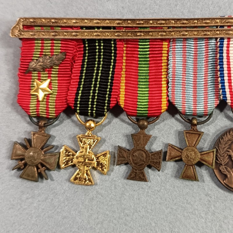 FRANCE BARRETTE DE 7 REDUCTIONS DES MEDAILLES MILITAIRES D'UN ANCIEN DE LA SECONDE GUERRE RESISTANT EVADE