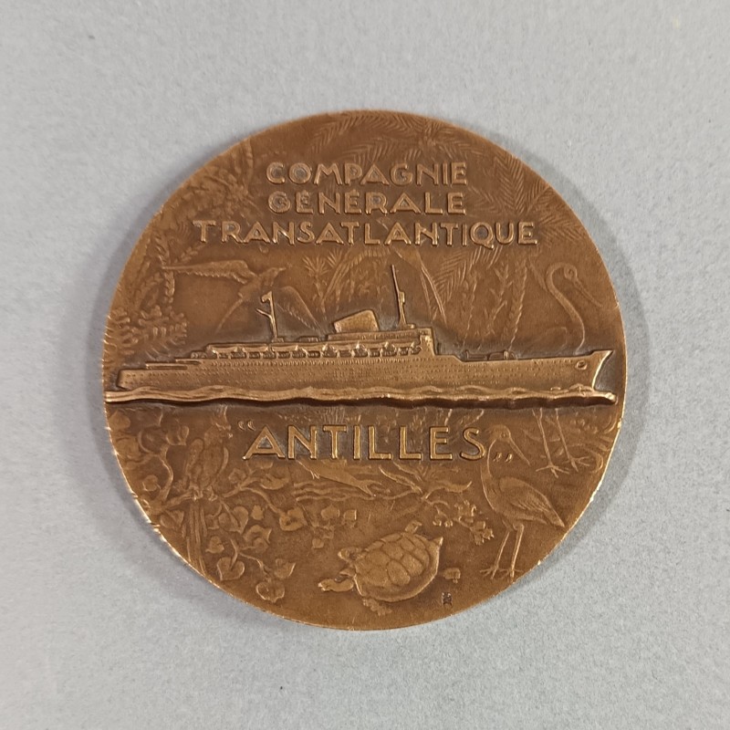 MEDAILLE EN BRONZE DE LA COMPAGNIE GENERALE TRANSATLANTIQUE BATEAU ANTILLES 1953 GRAVEUR R. DELAMARRE