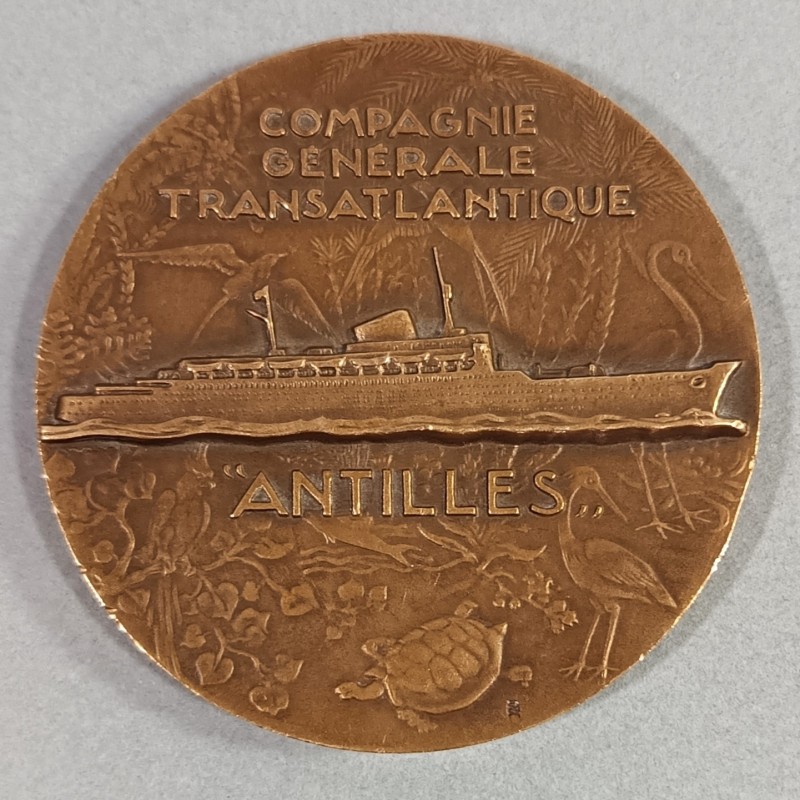 MEDAILLE EN BRONZE DE LA COMPAGNIE GENERALE TRANSATLANTIQUE BATEAU ANTILLES 1953 GRAVEUR R. DELAMARRE