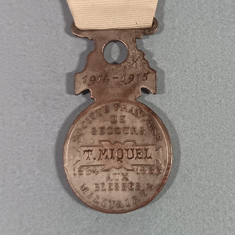 MEDAILLE DE LA CROIX ROUGE FRANCAISE SSBM SOCIETE DE SECOURS AUX BLESSES MILITAIRE ATTRIBUEE A UNE INFIMIERE 1914-1915
